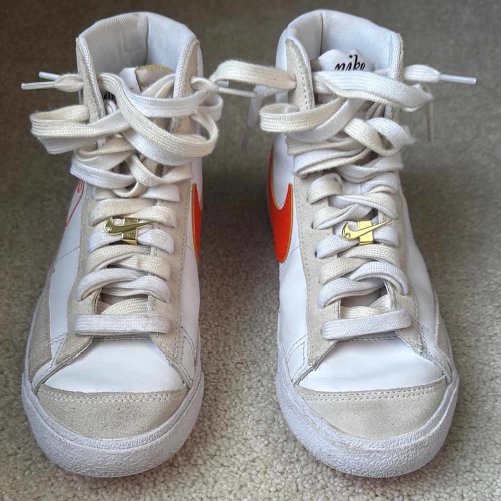 Nike High-Top Sneakers with Orange Swoosh